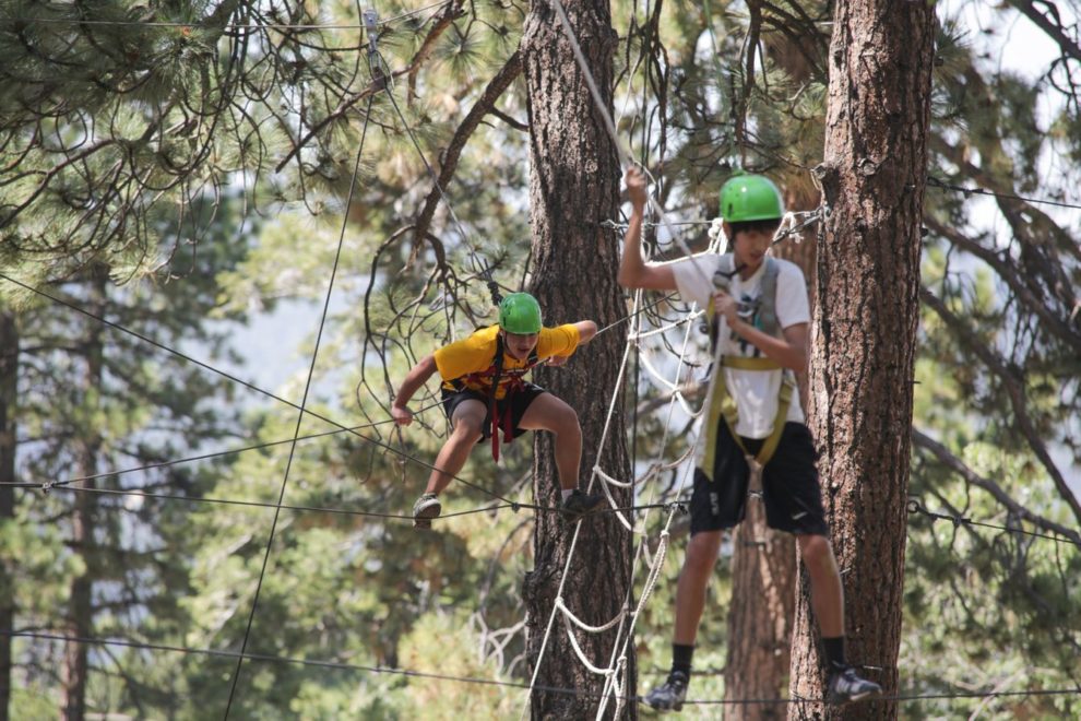Sophomores on a rope course during their class retreat in Big Bear, CA