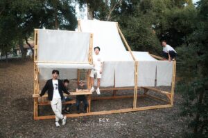 Michael Fu and his team pose with the completed Fabric Pavilion